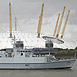 HMS Shoreham  passes the O2 Greenwich