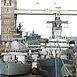 HMS Exeter berths alongside HMS Belfast London